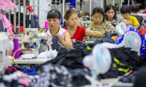 中国、景気鈍化で民間企業が苦境　賃金未払い・リストラ頻発
