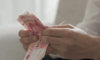 中国湖北省大手スーパーの財務担当者が2億元を持ち逃げ
